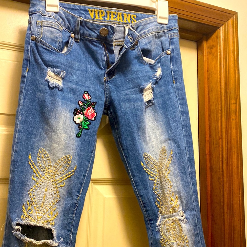 VIP denim jeans shredded with flower details